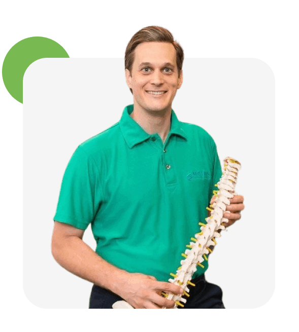 Dr. Egan Holding Spine PNG Dr. Michael J Egan - Motion Health Centre